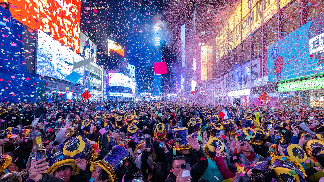 Revelers celebrate New Year's Eve in Times Square on January 01, 2023 in New York City. This year's New Year's Eve returned to pre-COVID-19 pandemic numbers with around 1 million people estimated to fill Times Square. (Photo by Alexi Rosenfeld/ Getty Images)