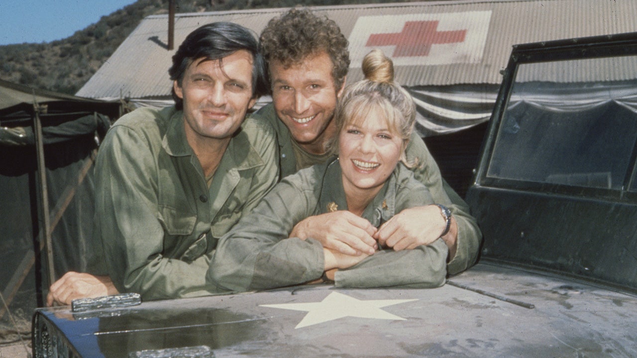 Portrait of, from left, American actors Alan Alda, as Captain Benjamin Hawkeye Pierce, Wayne Rogers, as Captain Trapper John McIntyre, and Loretta Swit, as Major Margaret Houlihan, on the television series 'MASH,' California, 1972. (Getty Images)