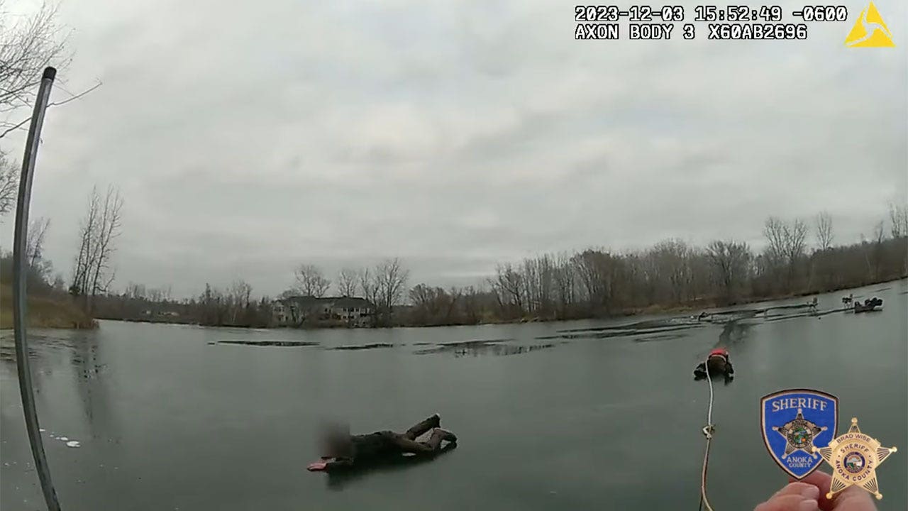 'Selfless' Minnesota deputy crawls across thin ice to rescue fishermen, dog: video