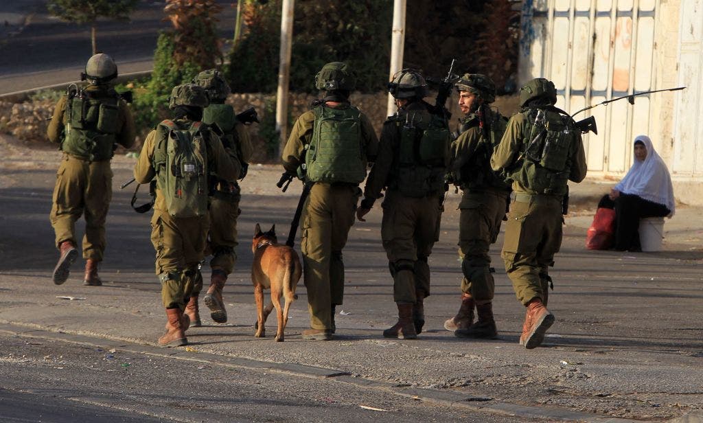 Israeli forces reveal footage of K9 unit clearing houses in Gaza, uncovering Hamas weapons