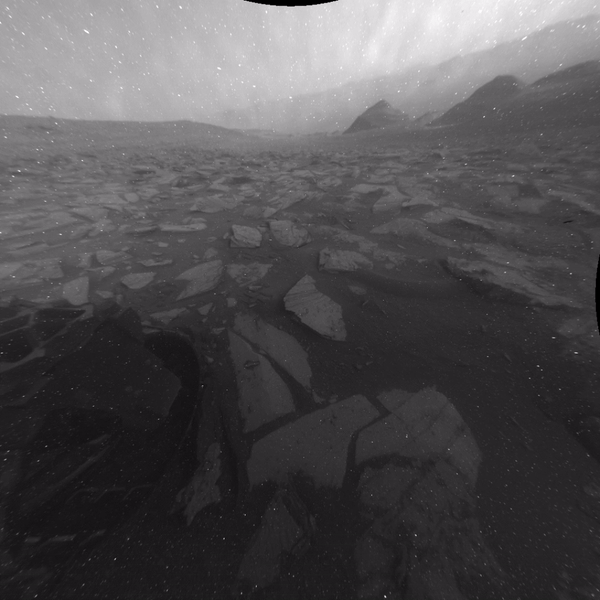 A gif of images from the Curiosity rover's back camera, showing a sloping Mars mountain