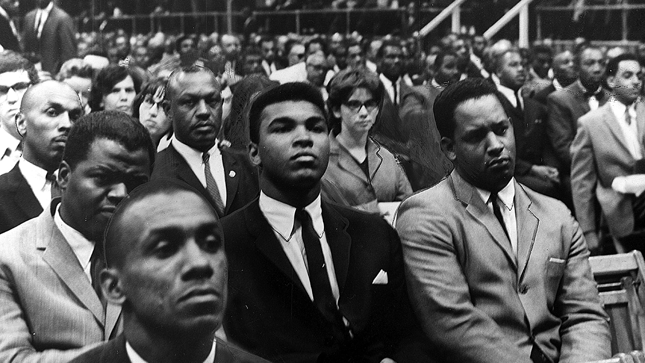 Muhammad Ali among large group of people