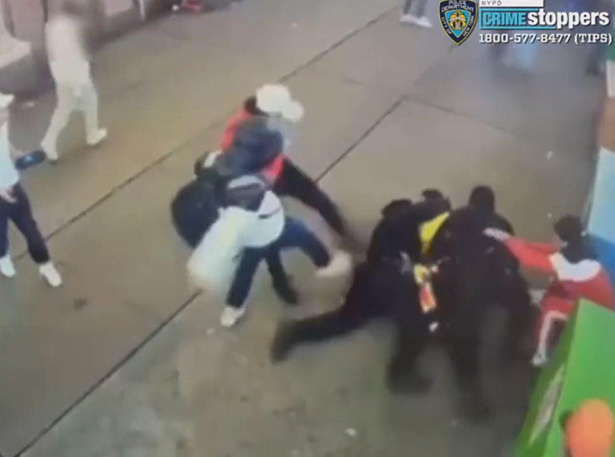 WATCH: NYPD officers attacked on surveillance video near Times Square by migrants later freed without bail