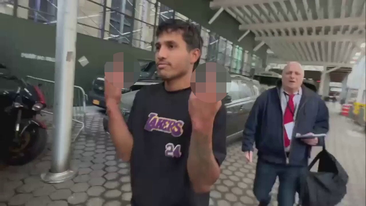News :Illegal migrant flips middle fingers after being charged with attacking NYPD in Times Square
