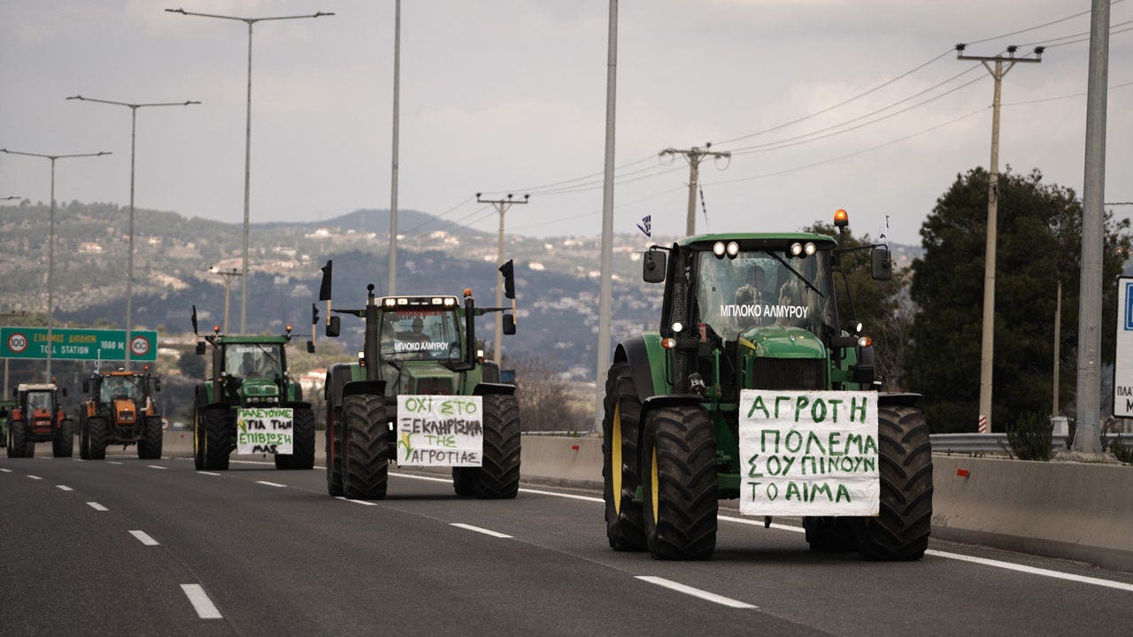 Greek farmers drive 200 tractors to Athens to protest rising costs