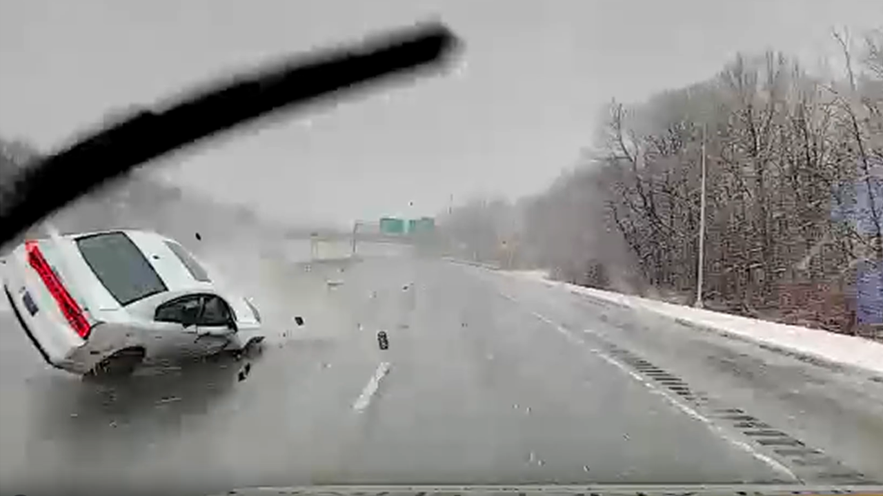 News :Massachusetts ambulance driver narrowly avoids highway rollover crash in front of him: video