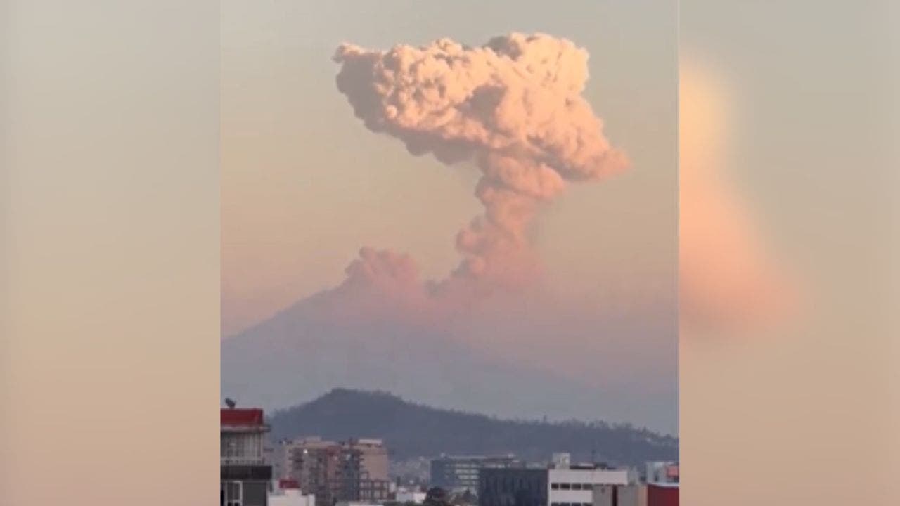 Mexican volcano belches a plume of smoke and ash 2 miles into the air