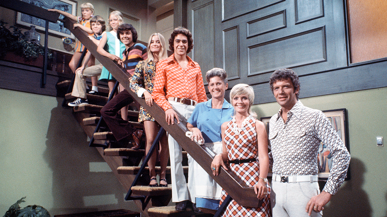 How household TV shows like 'Modern Family' and 'Full House' compare to 'The Brady Bunch'