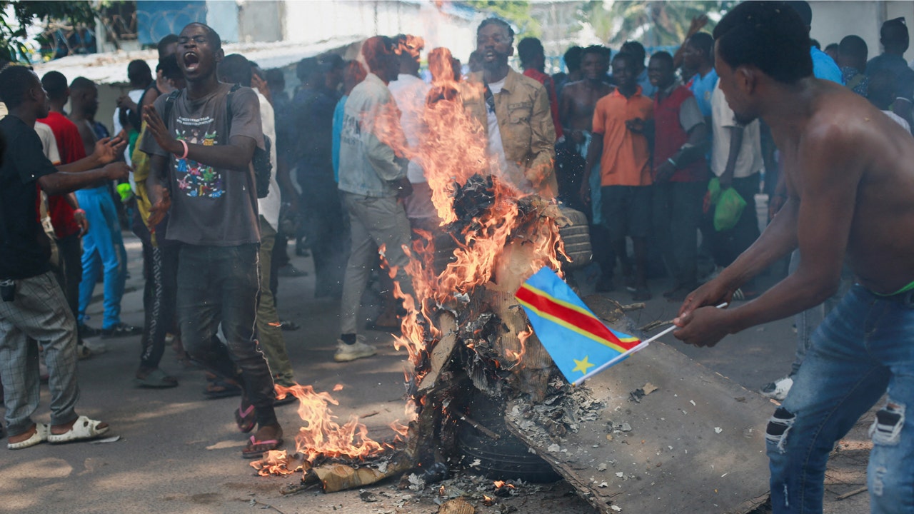 Congolese demonstrators burn US, Belgian flags as tensions flare
