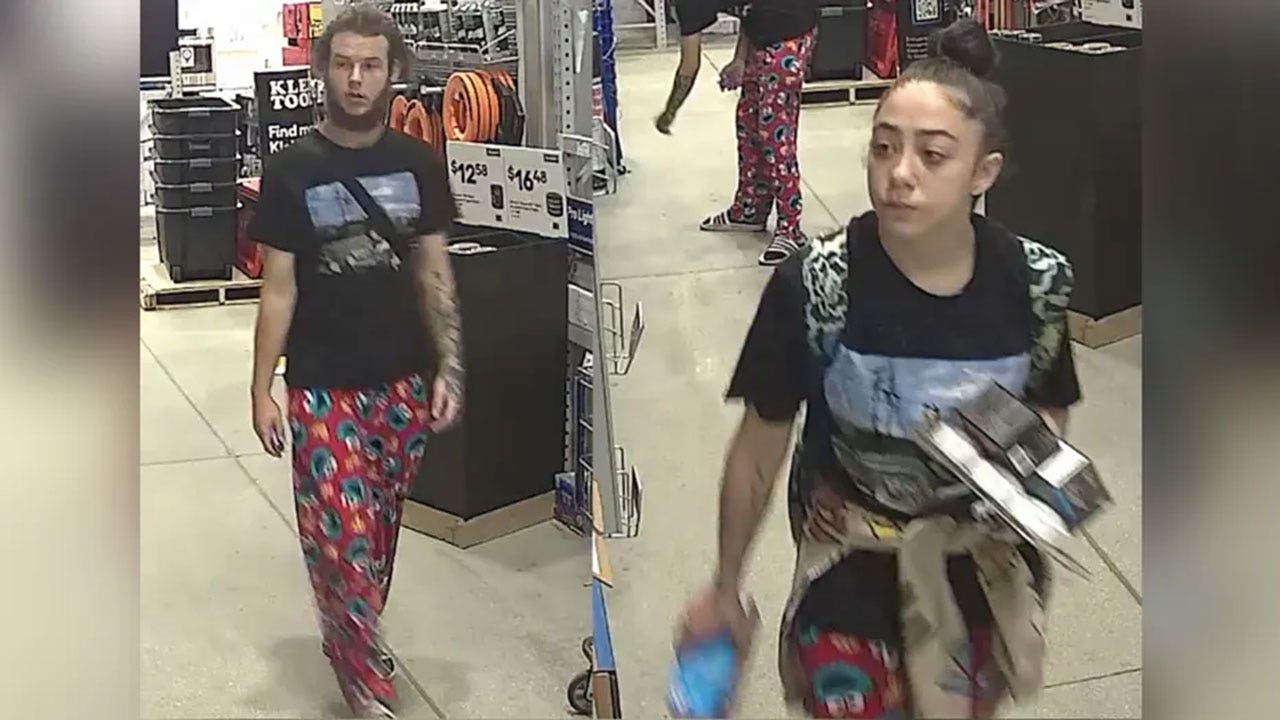 Couple wearing matching Cookie Monster pants accused of armed robbery, animal cruelty