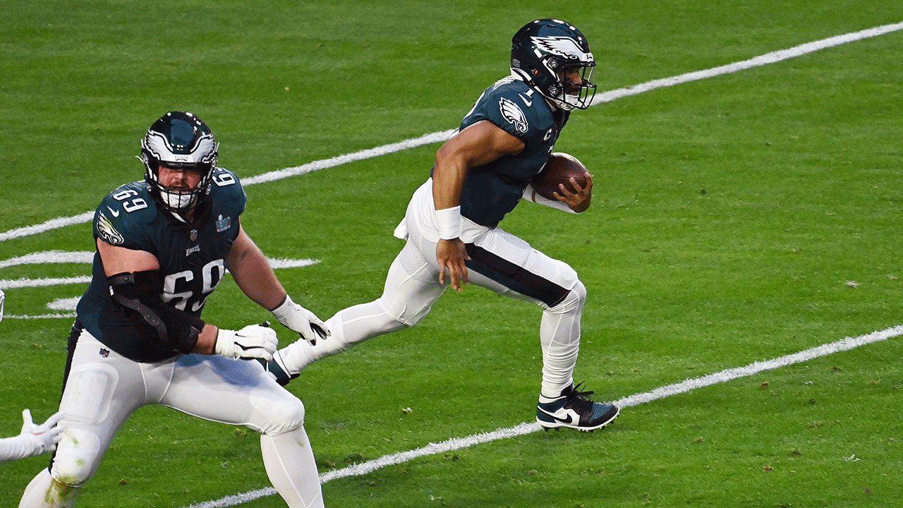 Jalen Hurts running with the ball in Super Bowl LVII