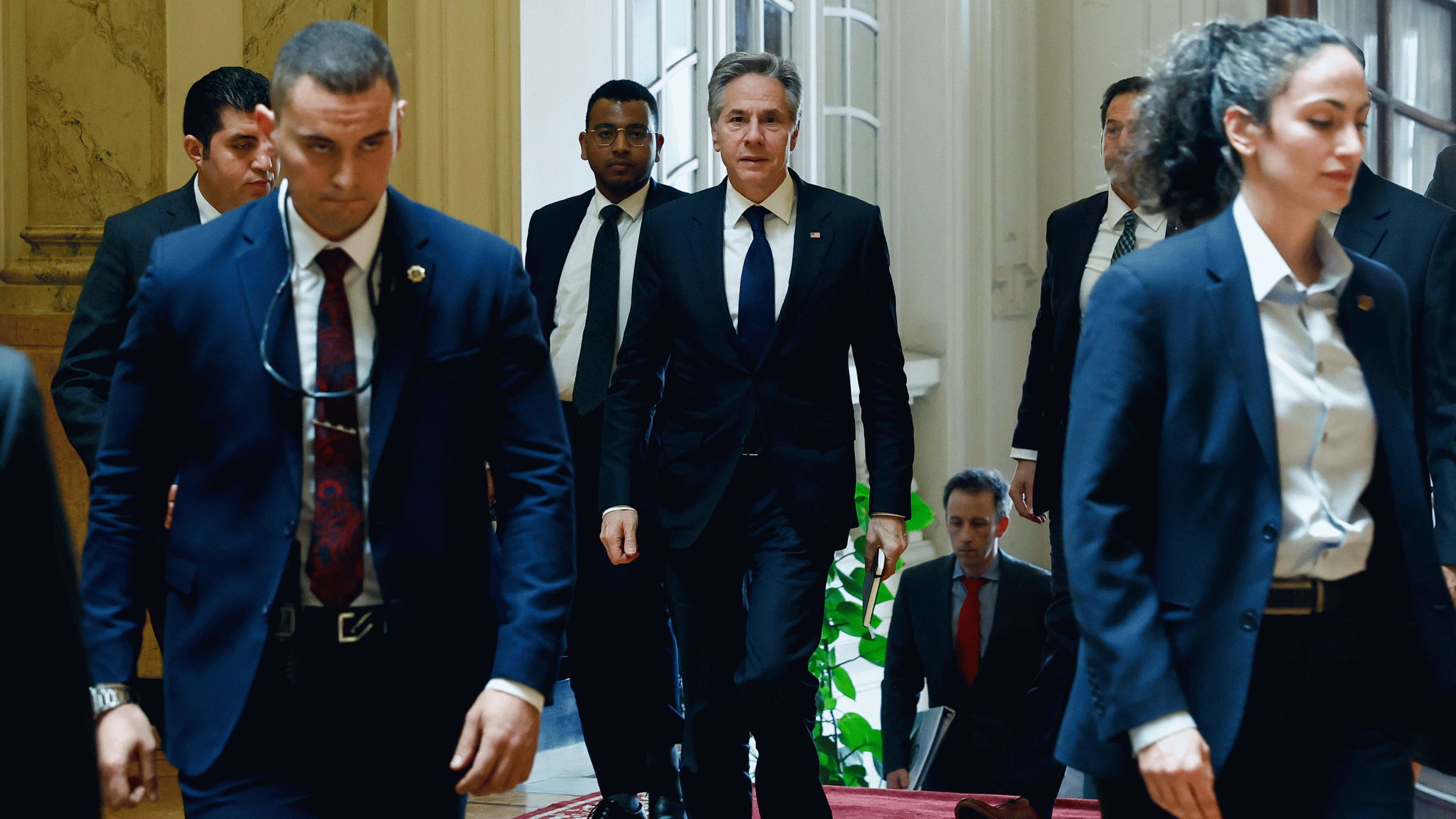 U.S. Secretary of State Antony Blinken, centre, walks to meet with Egyptian Foreign Minister Sameh Shoukry, in Cairo, Egypt, Thursday, March 21, 2024. (Evelyn Hockstein/Pool Photo via AP)
