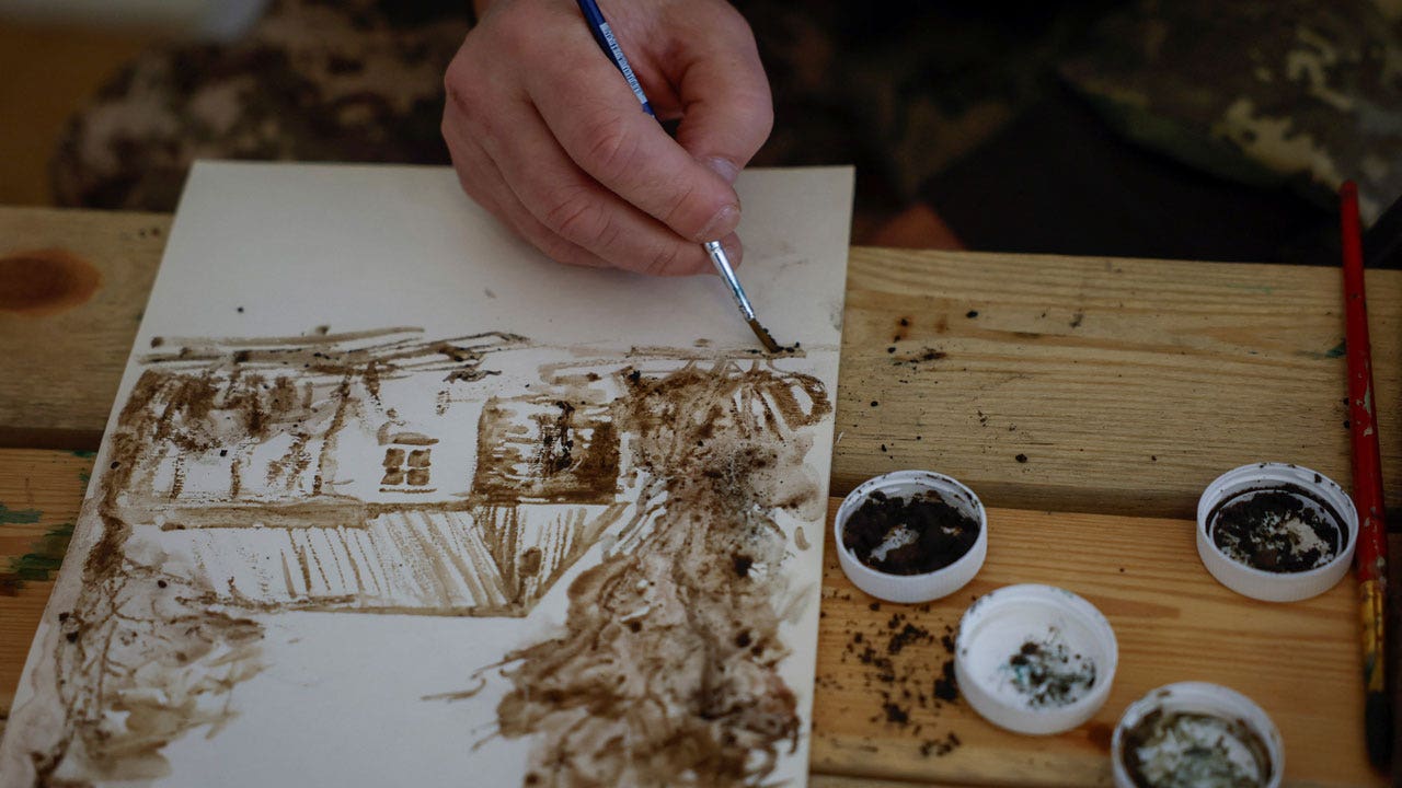 Read more about the article Ukrainian artist-turned-soldier uses mud and ash from the front lines to paint nature, war