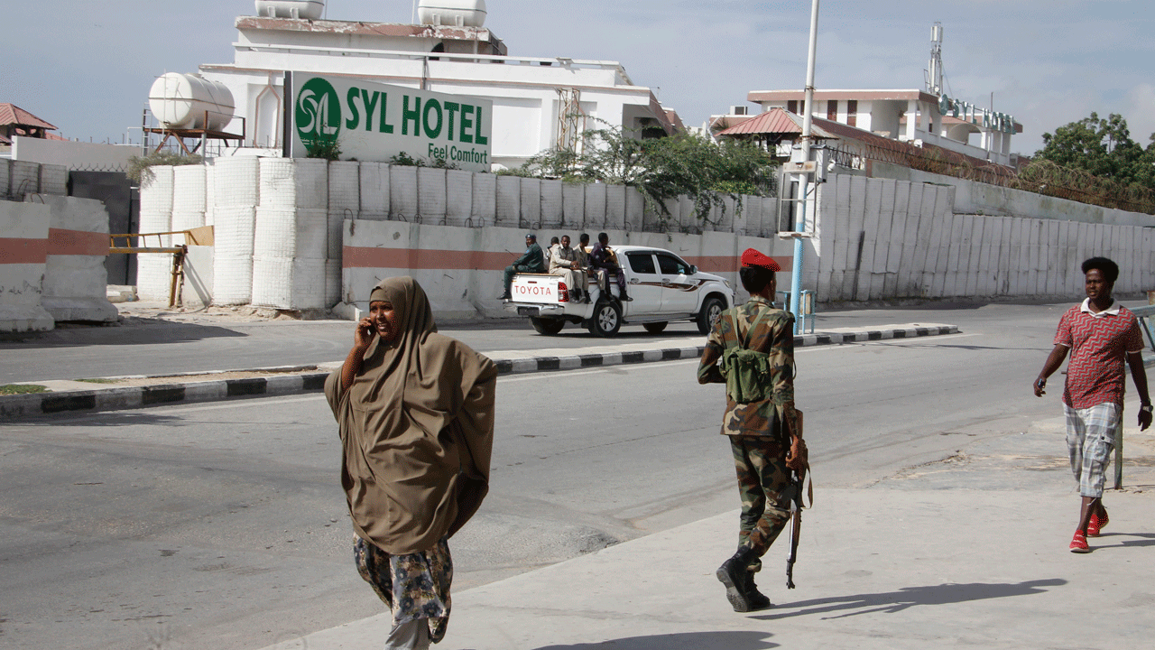 Loud explosion is heard as Somali militant group says its fighters have attacked a hotel in capital