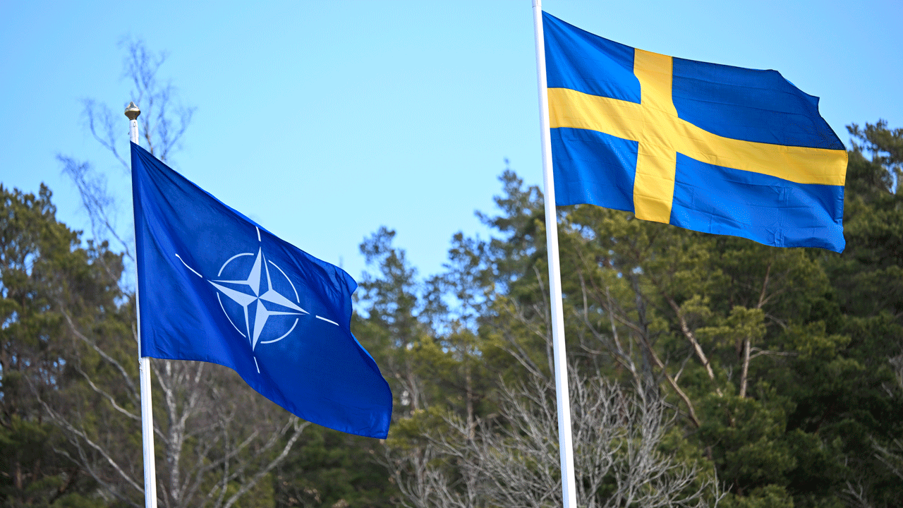 Read more about the article Sweden’s flag is raised at NATO headquarters to cement its place as the 32nd member of the alliance