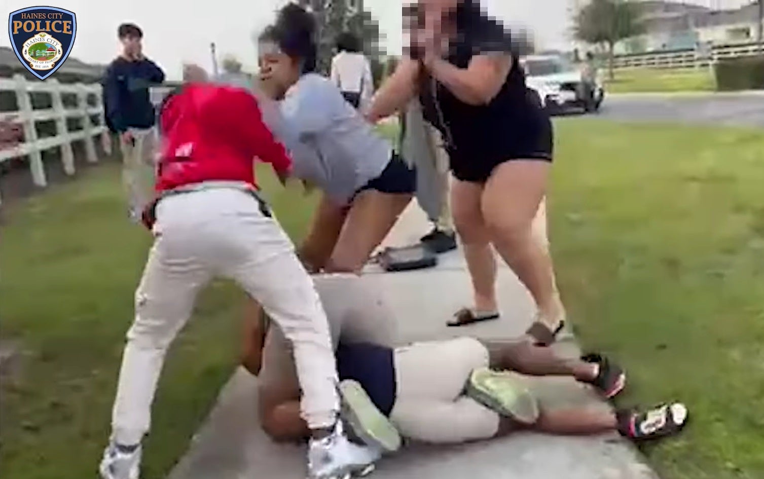 Florida woman 'instigated, jeered and intervened' in student school bus fight in wild melee video: police