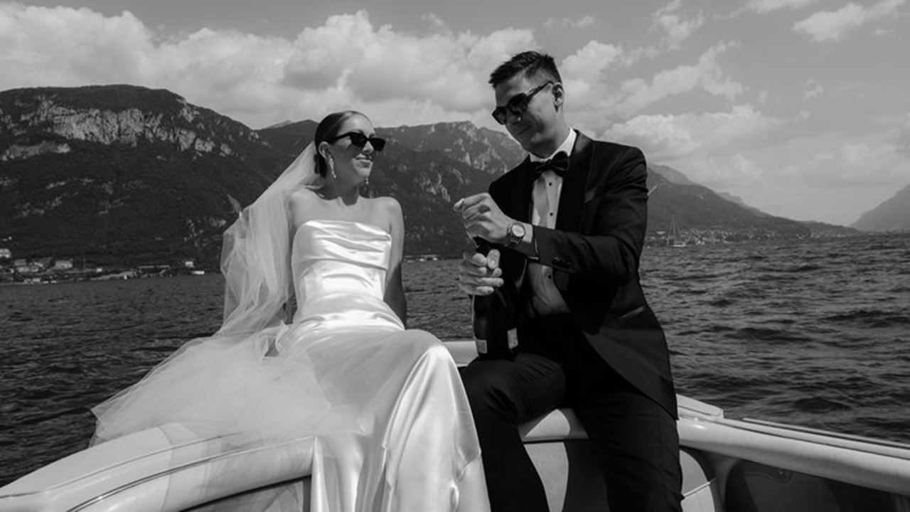 A bride and groom connected a boat