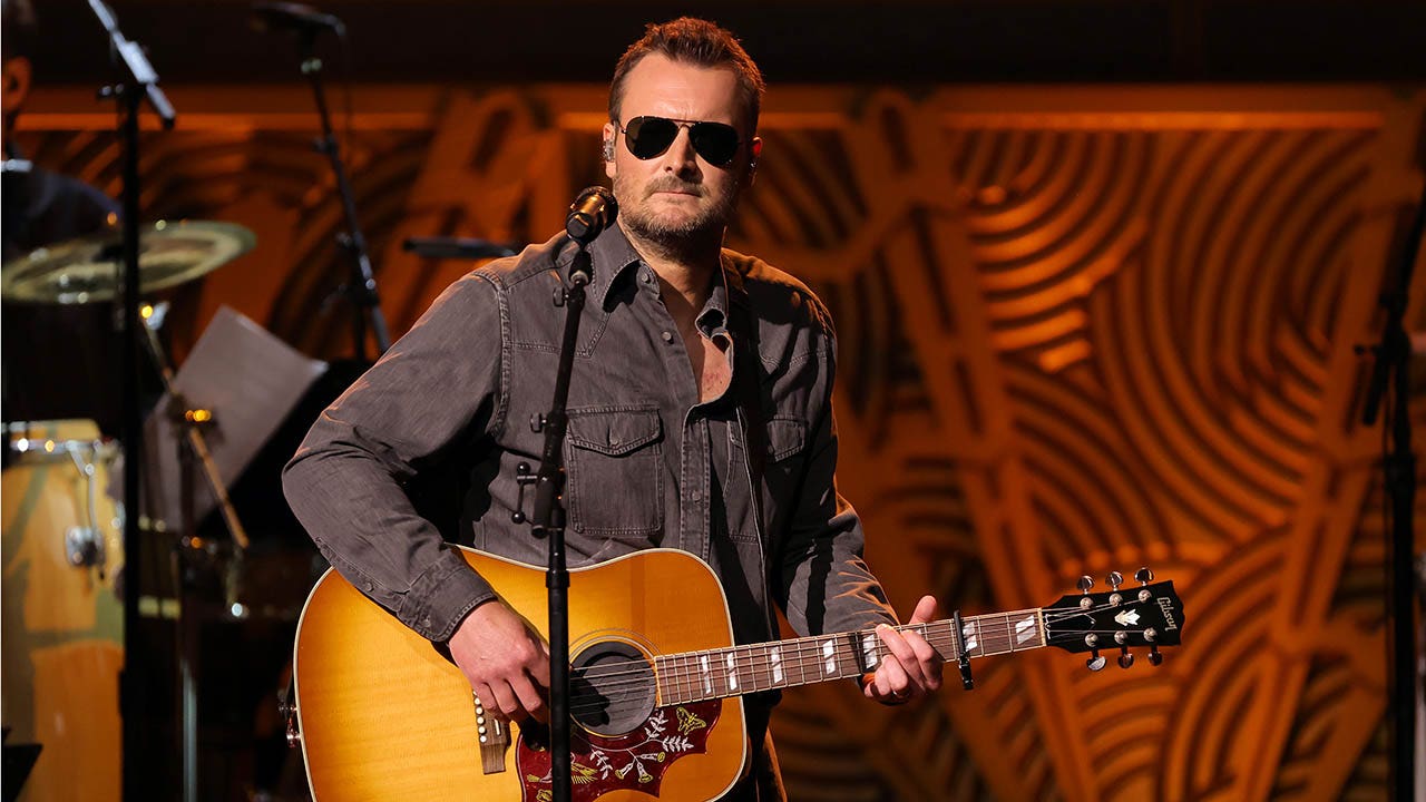 Country star Eric Church says music saved him after near-fatal blood clot, brother's death