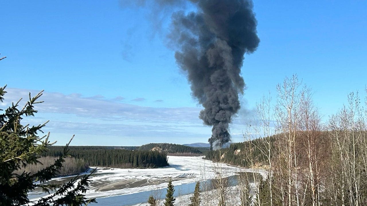Pilot reported that plane carrying fuel caught on fire before fatal Alaska crash