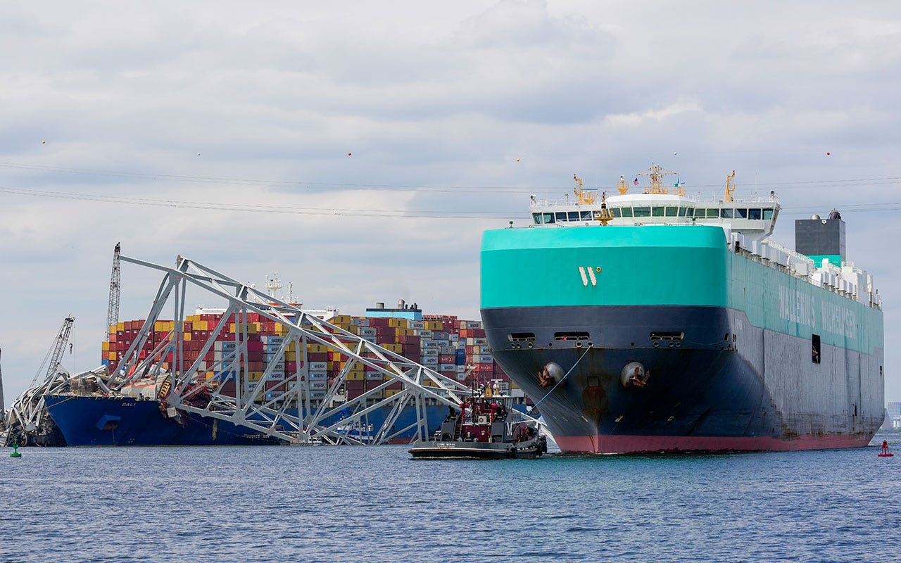 Baltimore port allows first ship to pass through since bridge collapse