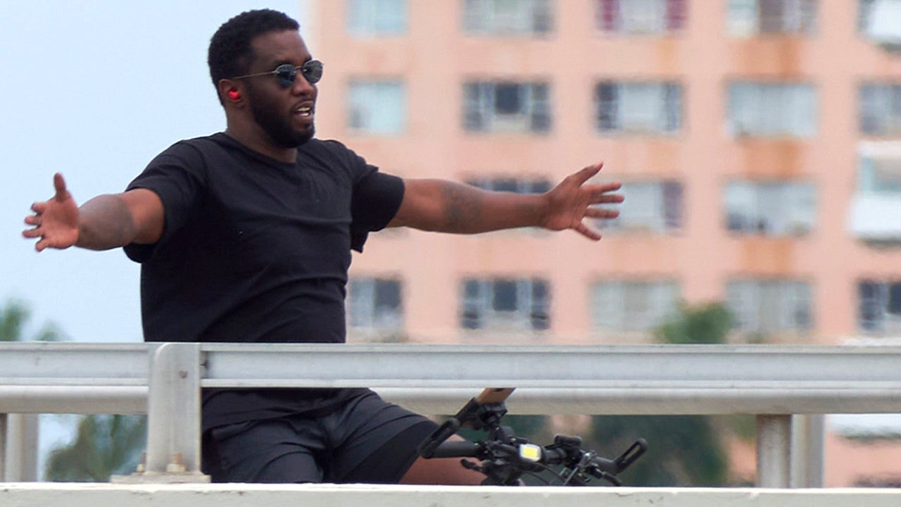 Sean 'Diddy' Combs bikes around Miami Beach, appearing carefree days after federal raids