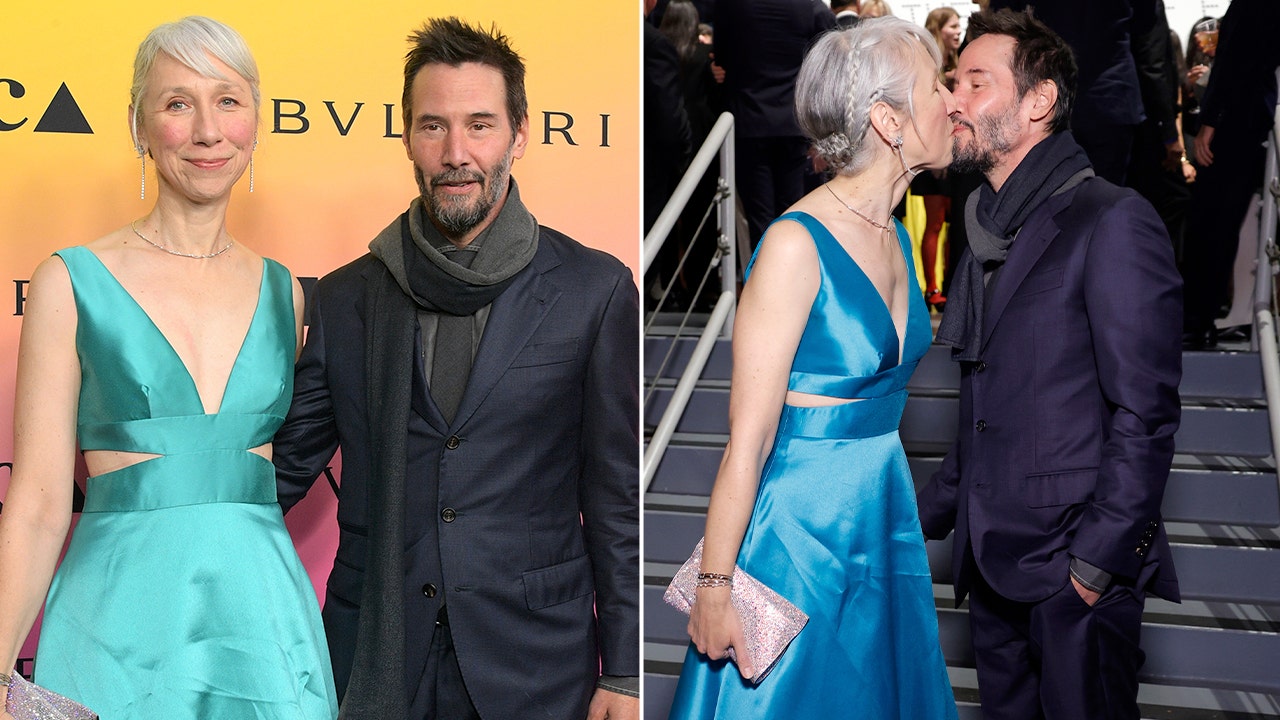 Keanu Reeves turns heads on red carpet as star kisses girlfriend Alexandra Grant with eyes wide open again