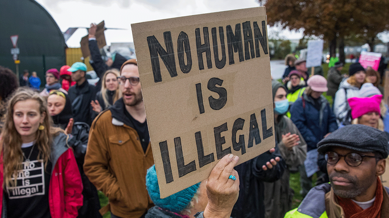 No Human is Illegal sign
