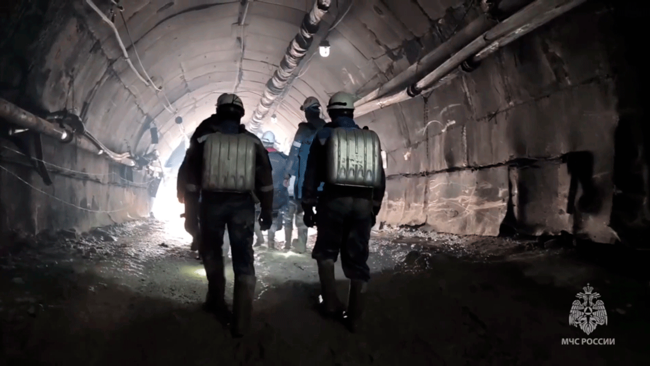 Russian crews end 2-week rescue effort to reach 13 miners in a collapsed mine and declare them dead