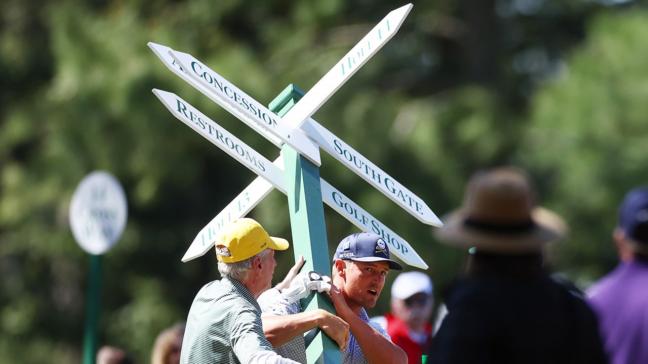 Read more about the article Bryson DeChambeau rips sign out of ground before shot at Masters