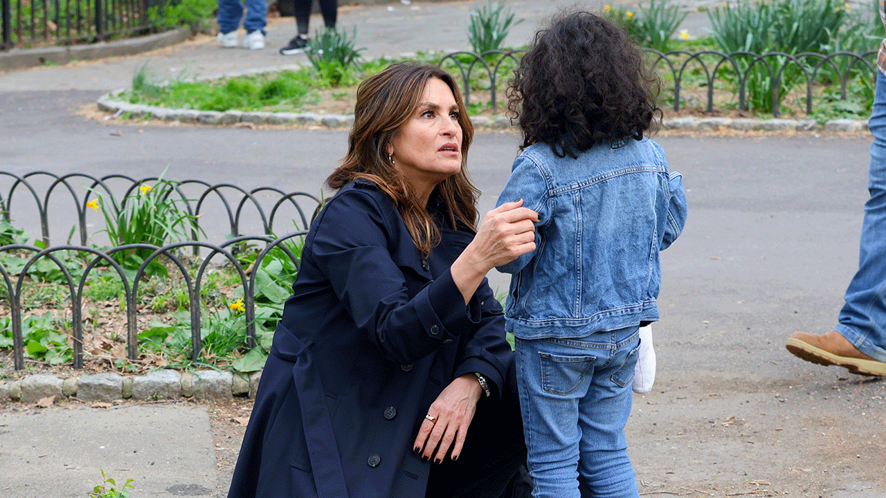 Mariska Hargitay helping young child locate her mother during filming of "SVU"