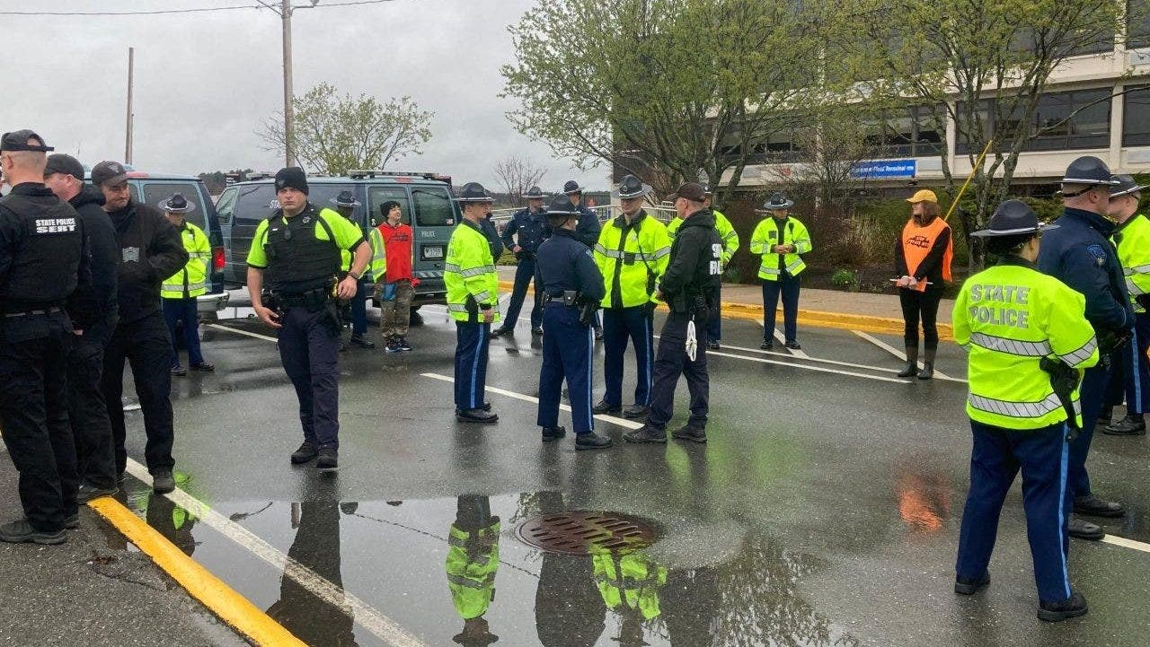 Climate activists arrested for blocking airstrip in massachusetts