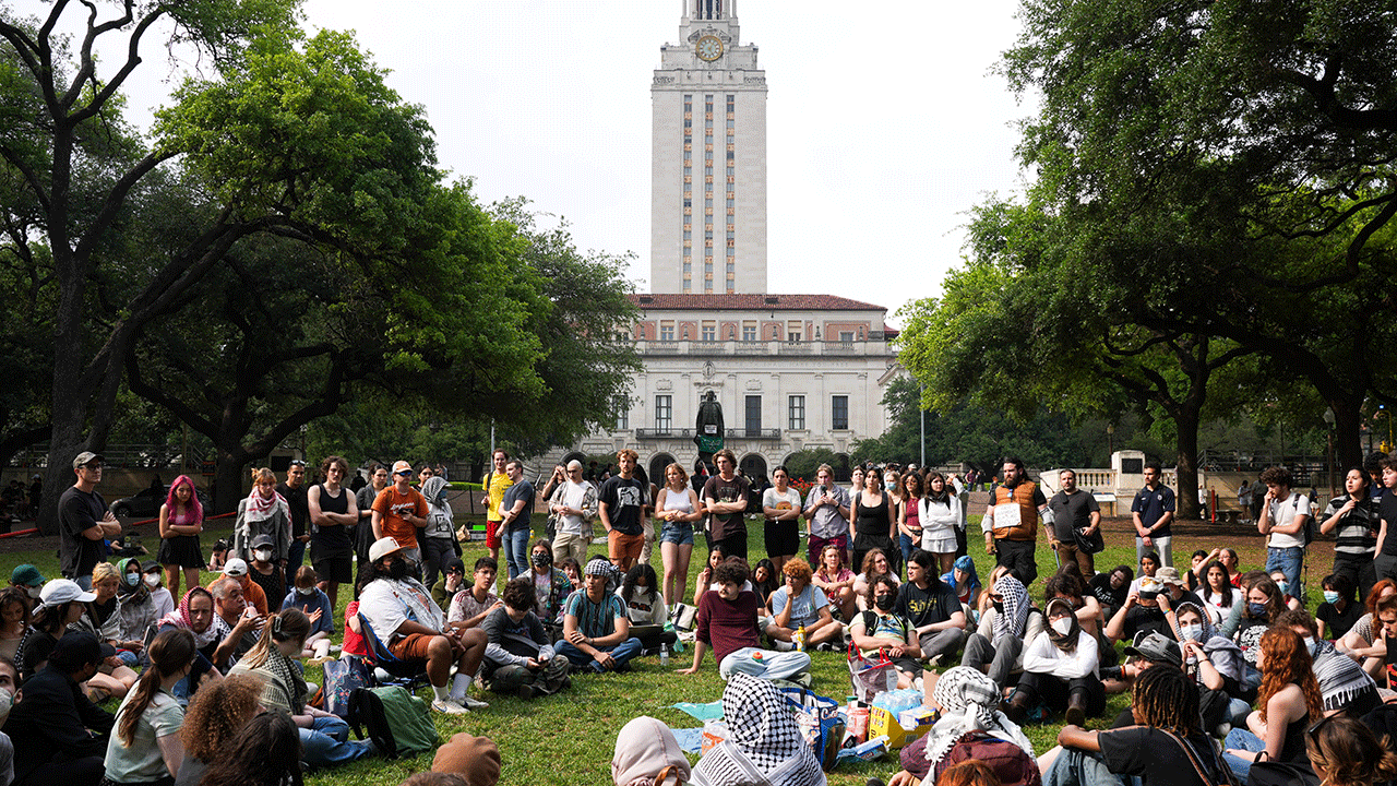 Pro-Palestinian students gather in a courtyard at the University of Texas at Austin.