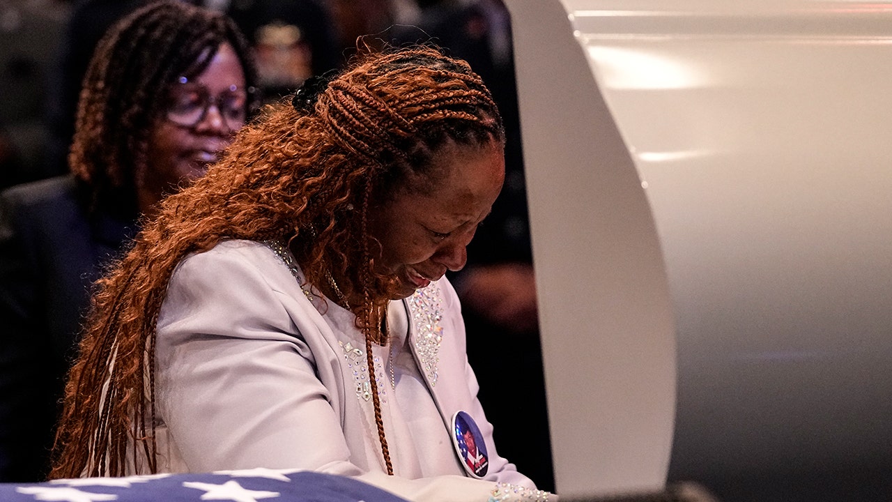 Hundreds pack funeral for roger fortson, the airman killed in his home by a florida deputy
