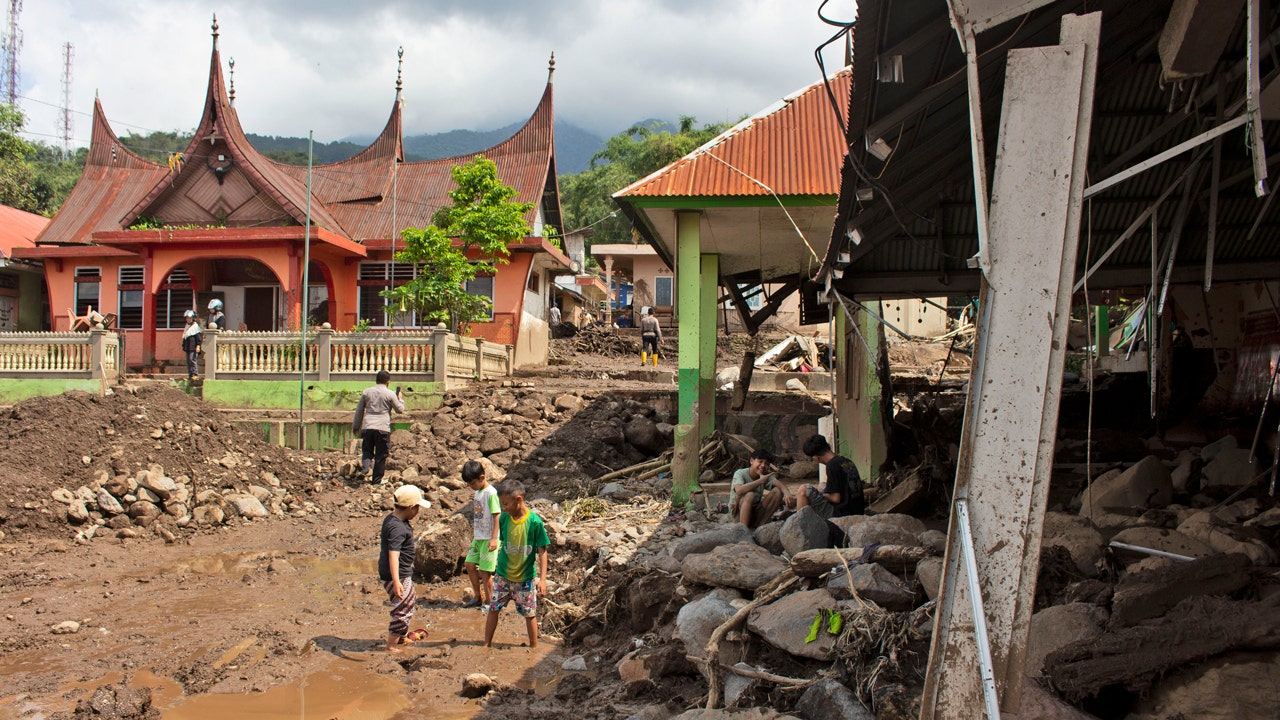 Extra our bodies discovered after Indonesia flash floods