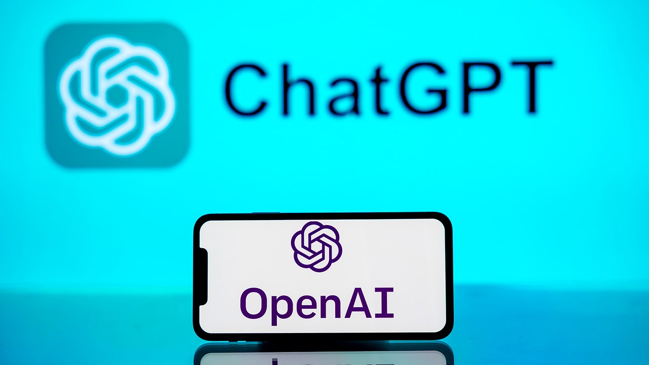 INDIA - 2024/05/17: In this photo illustration, the OpenAI logo is seen displayed on a mobile phone screen with ChatGPT logo in the background. (Photo Illustration by Idrees Abbas/SOPA Images/LightRocket via Getty Images) (Idrees Abbas/SOPA Images/LightRocket via Getty Images)