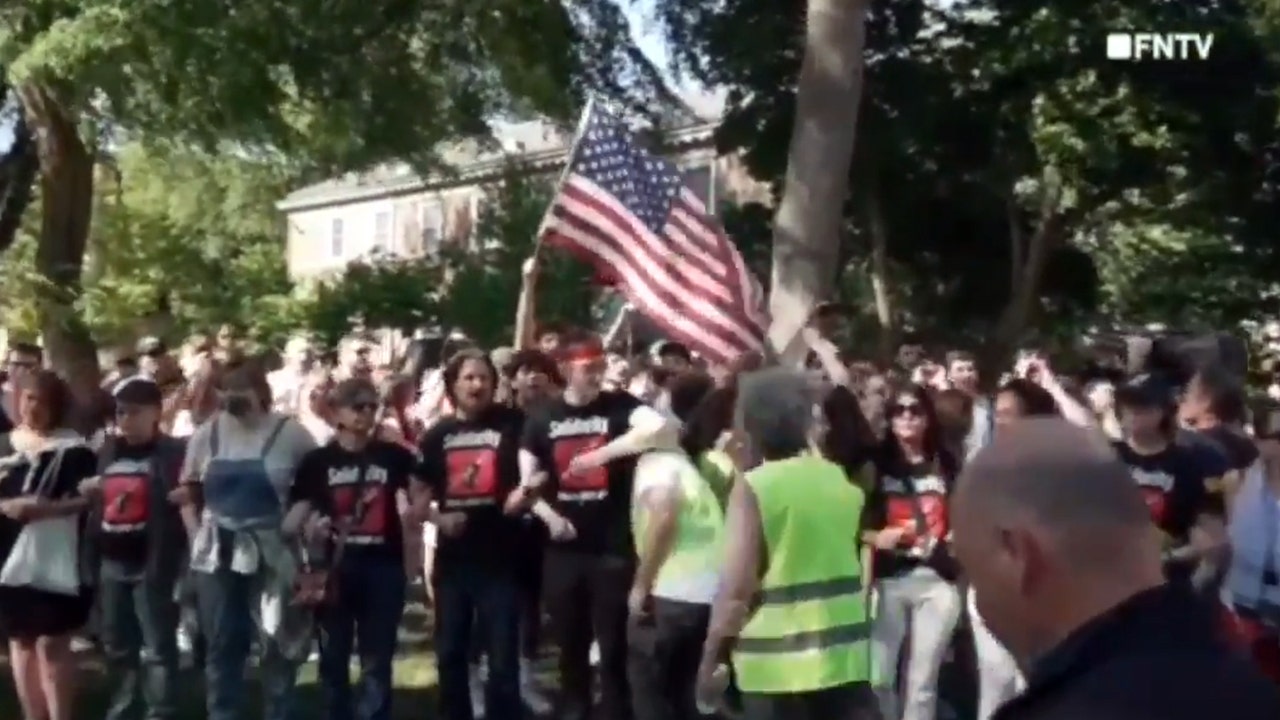 Rutgers students counter anti-israel agitators on campus by waving american flag, chanting 'usa! Usa! '