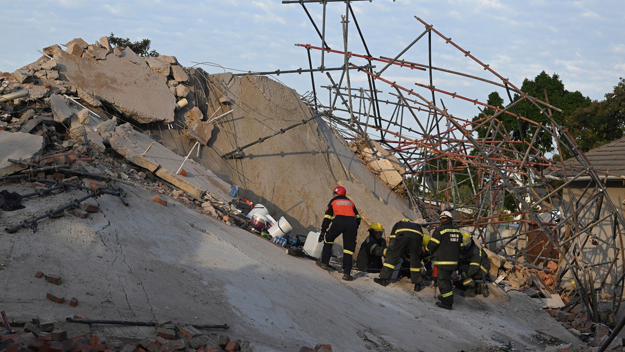 Rescuers make contact with 11 workers buried alive by South Africa building collapse