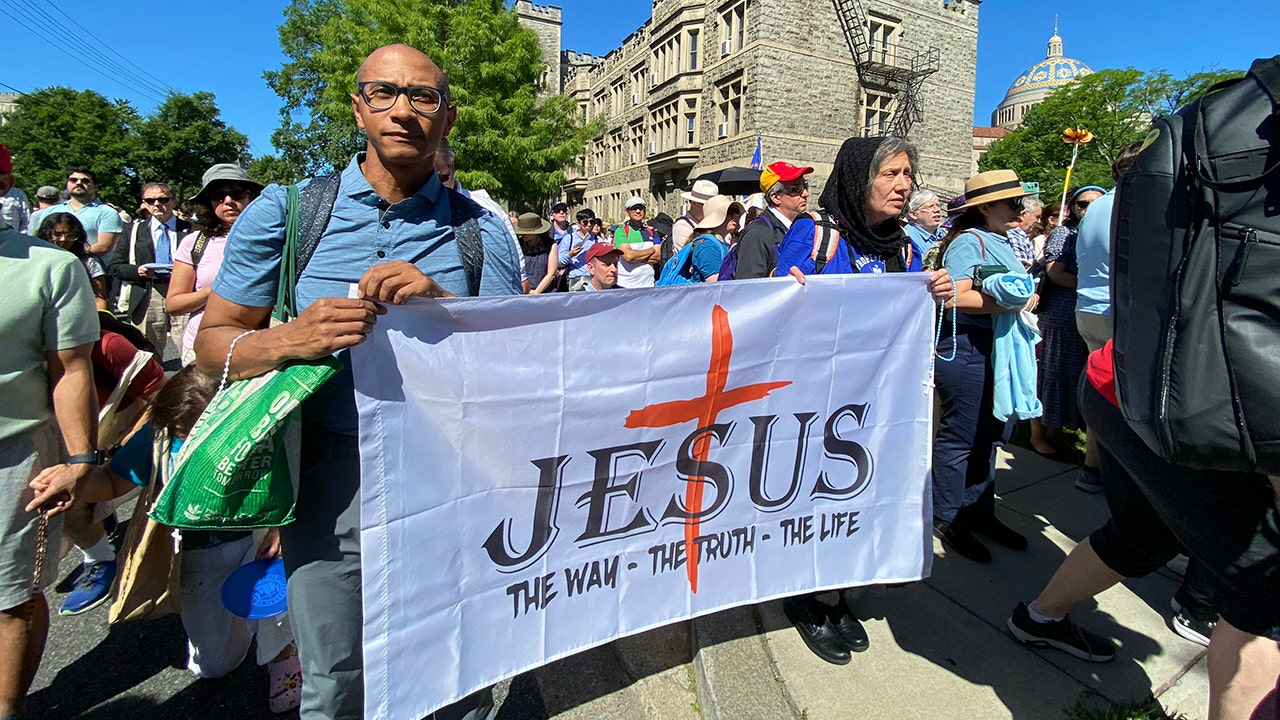 'Jesus is here': Thousands join Eucharistic procession in Washington, DC