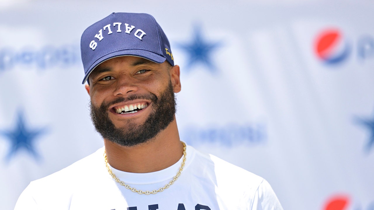 Cowboys’ Dak Prescott downplays concerns about foot after walking boot pic emerges