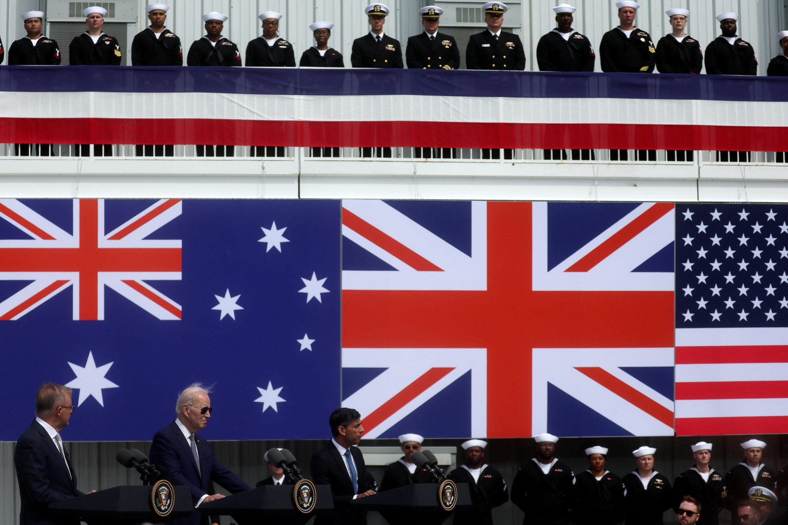 U.S. President Joe Biden, Australian Prime Minister Anthony Albanese and British Prime Minister Rishi Sunak deliver remarks on the Australia - United Kingdom - U.S. (AUKUS) partnership, after a trilateral meeting, at Naval Base Point Loma in San Diego, California U.S. March 13, 2023. REUTERS/Leah Millis