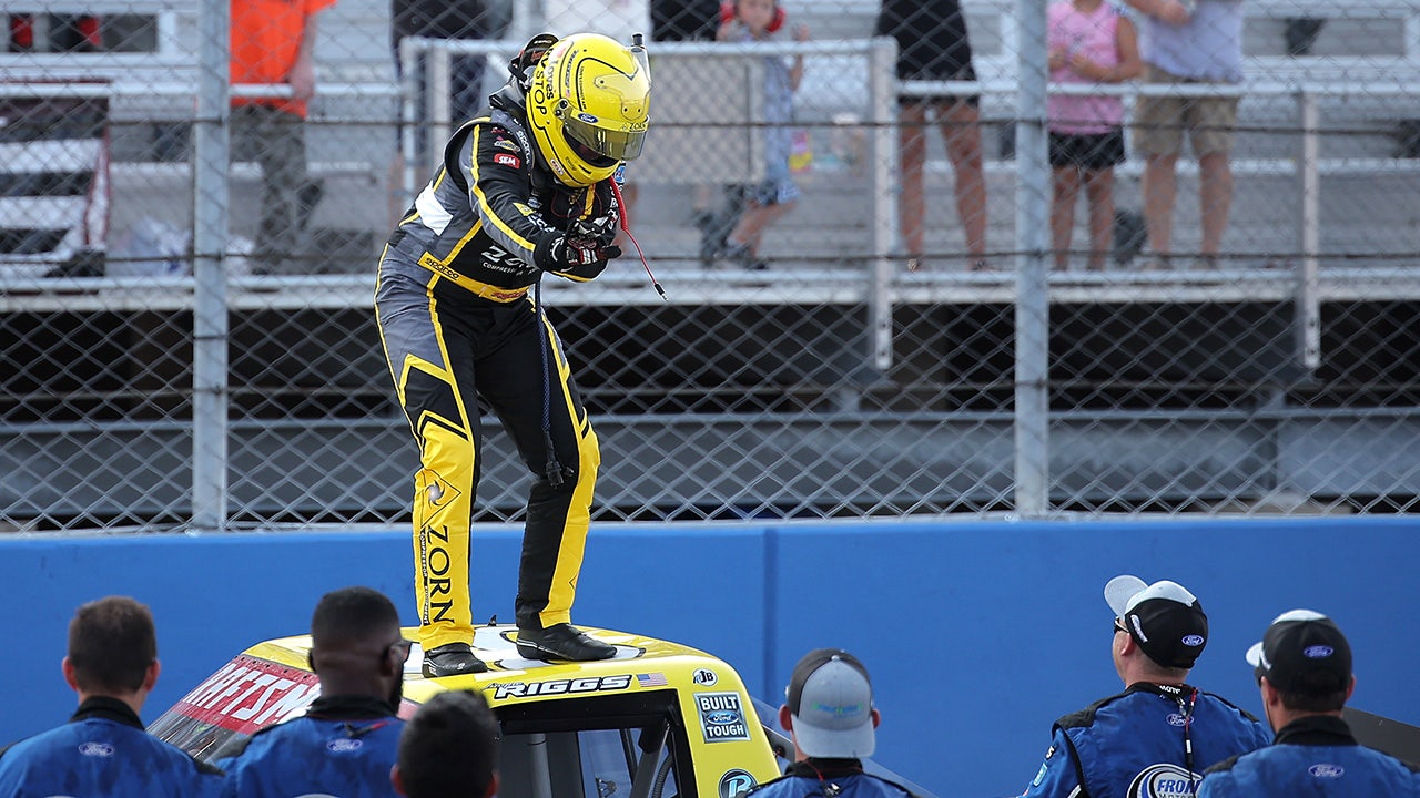 NASCAR Truck Series driver Layne Riggs dislocates his shoulder while celebrating victory