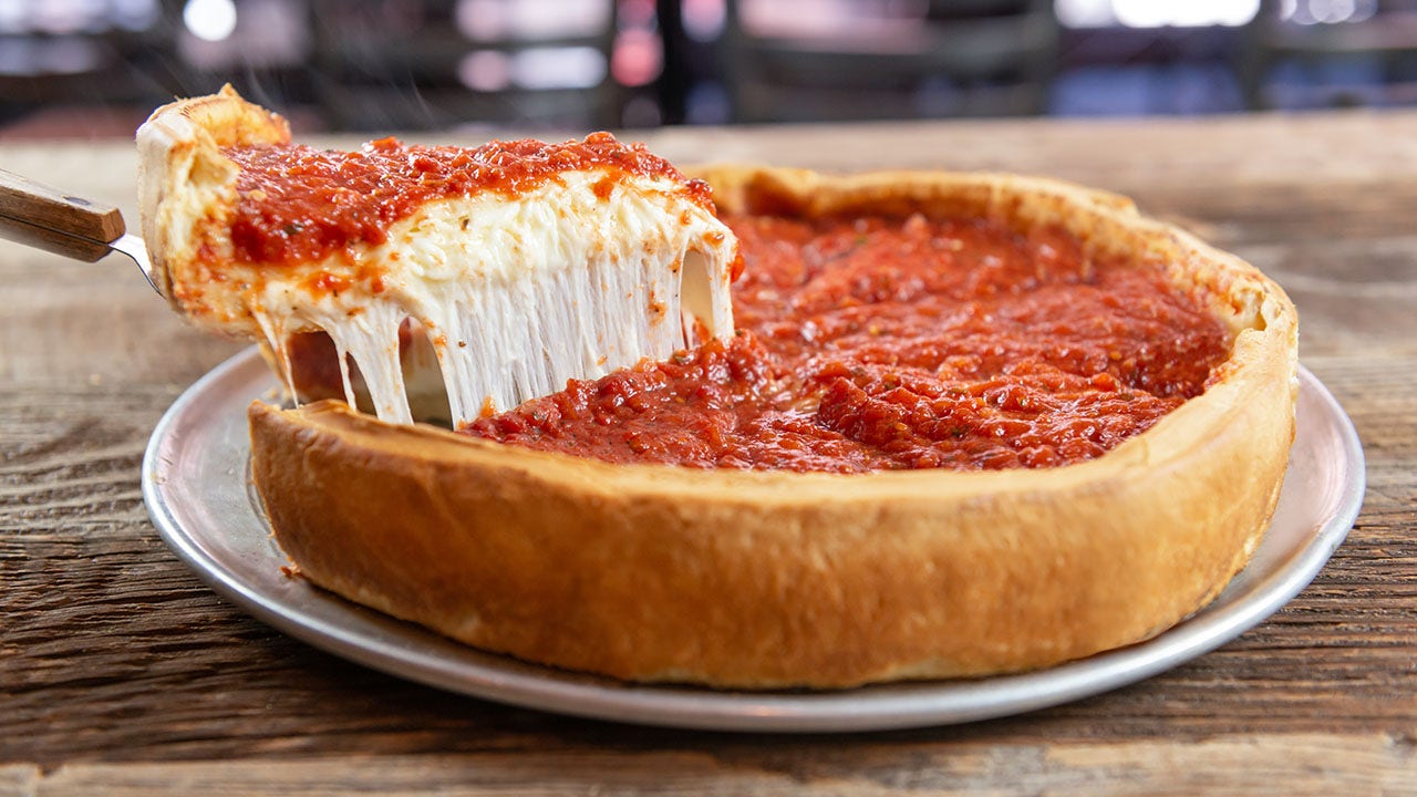 Chicago Pizza is a deep-dish delight that can be eaten with a fork and knife