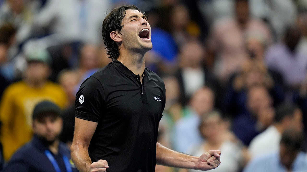 American Taylor Fritz aims to make history and advances to the US Open final after outlasting Frances Tiafoe