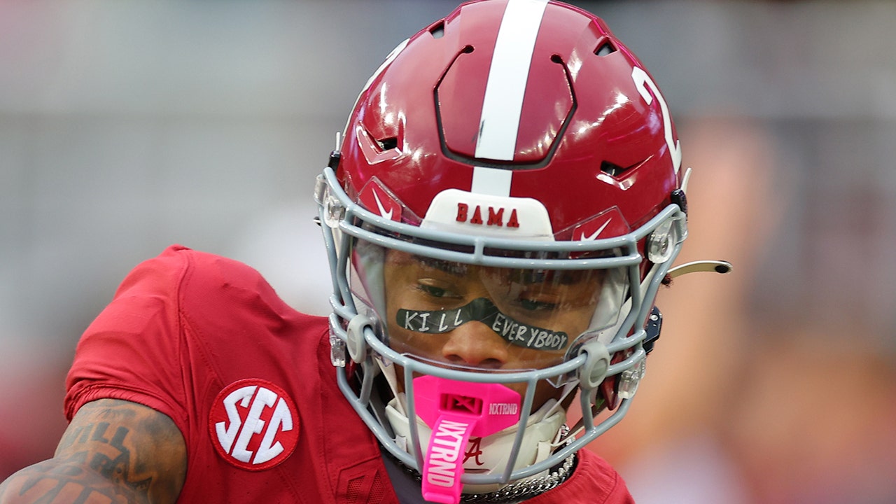 Alabama’s 17-year-old star receiver writes a blunt two-word message on his black eye before the breakout game