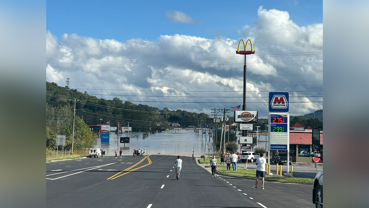 The college football team is stranded on buses on the flooded highway due to the destruction caused by Hurricane Helene