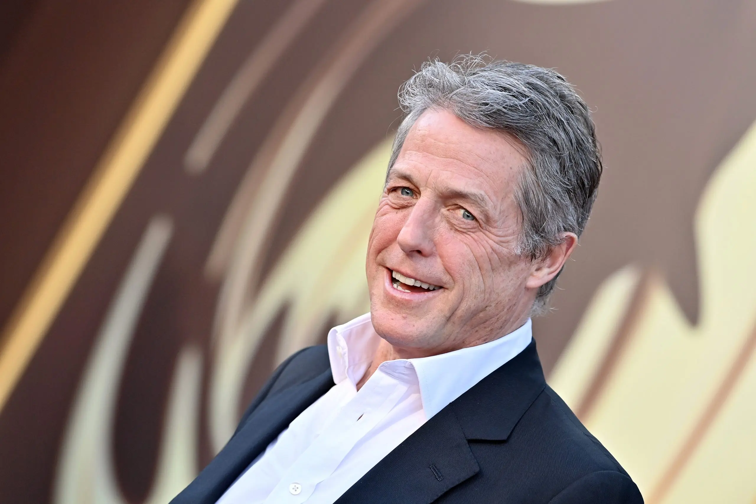 Hugh Grant attends the Los Angeles Premiere of Warner Bros. 