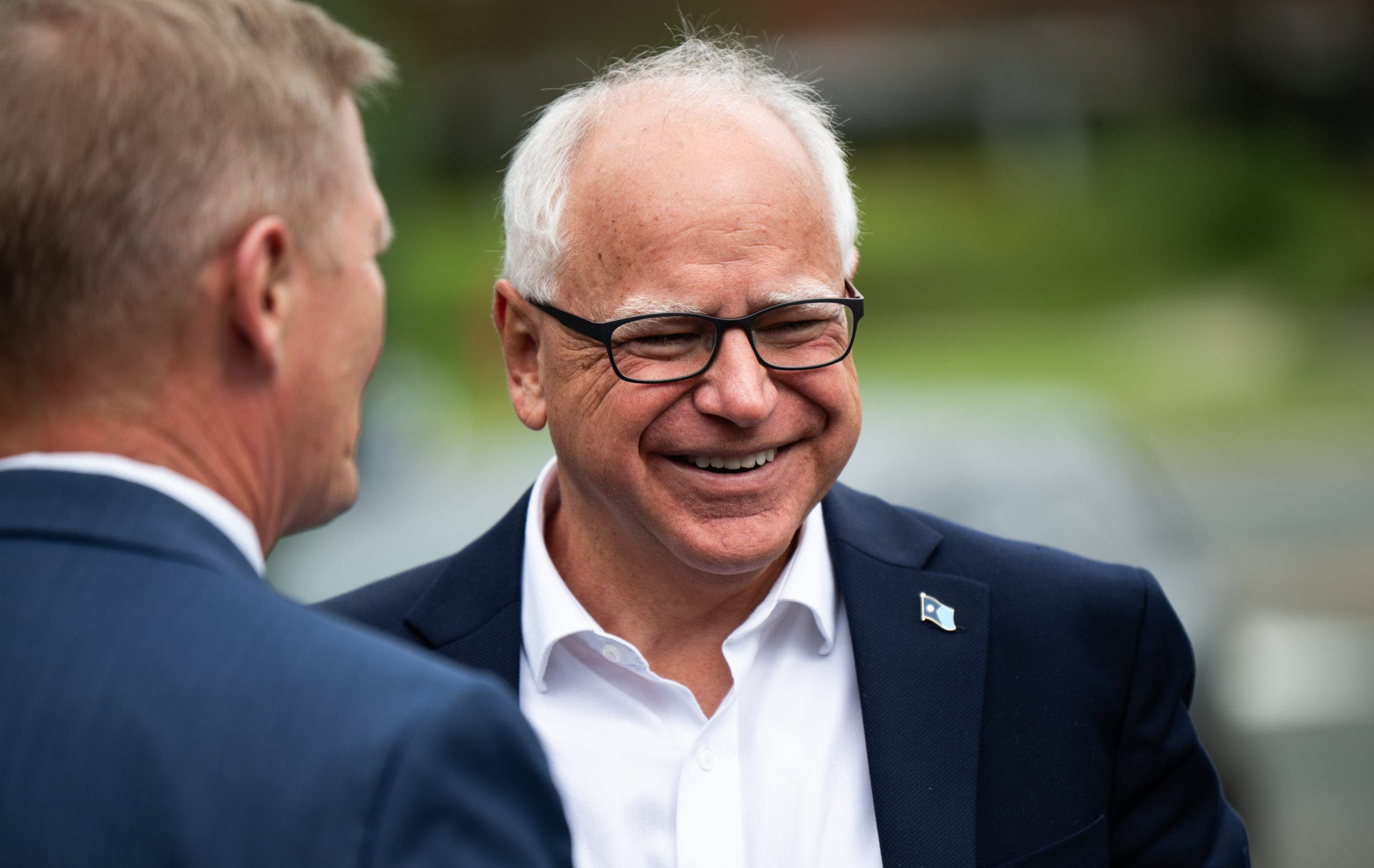 Vikings fan Tim Walz discusses security concerns about his Lambeau visit, praises head coach Kevin O'Connell