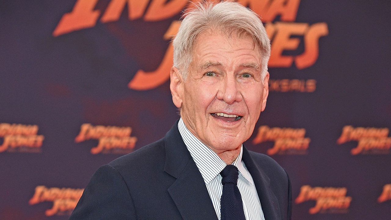 Harrison Ford, 82, says he should be 'sitting on my a–,' but loves working