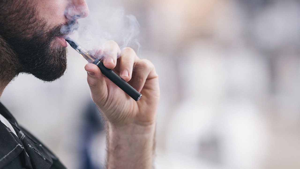 Man smoking a vape (iStock)