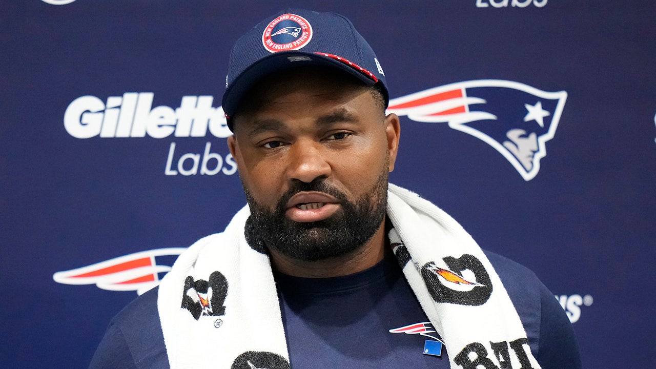 New England Patriots head coach Jerod Mayo speaks with media ahead of NFL football practice, Friday, Oct. 18, 2024, in Harrow, England. (AP Photo/Steve Luciano)